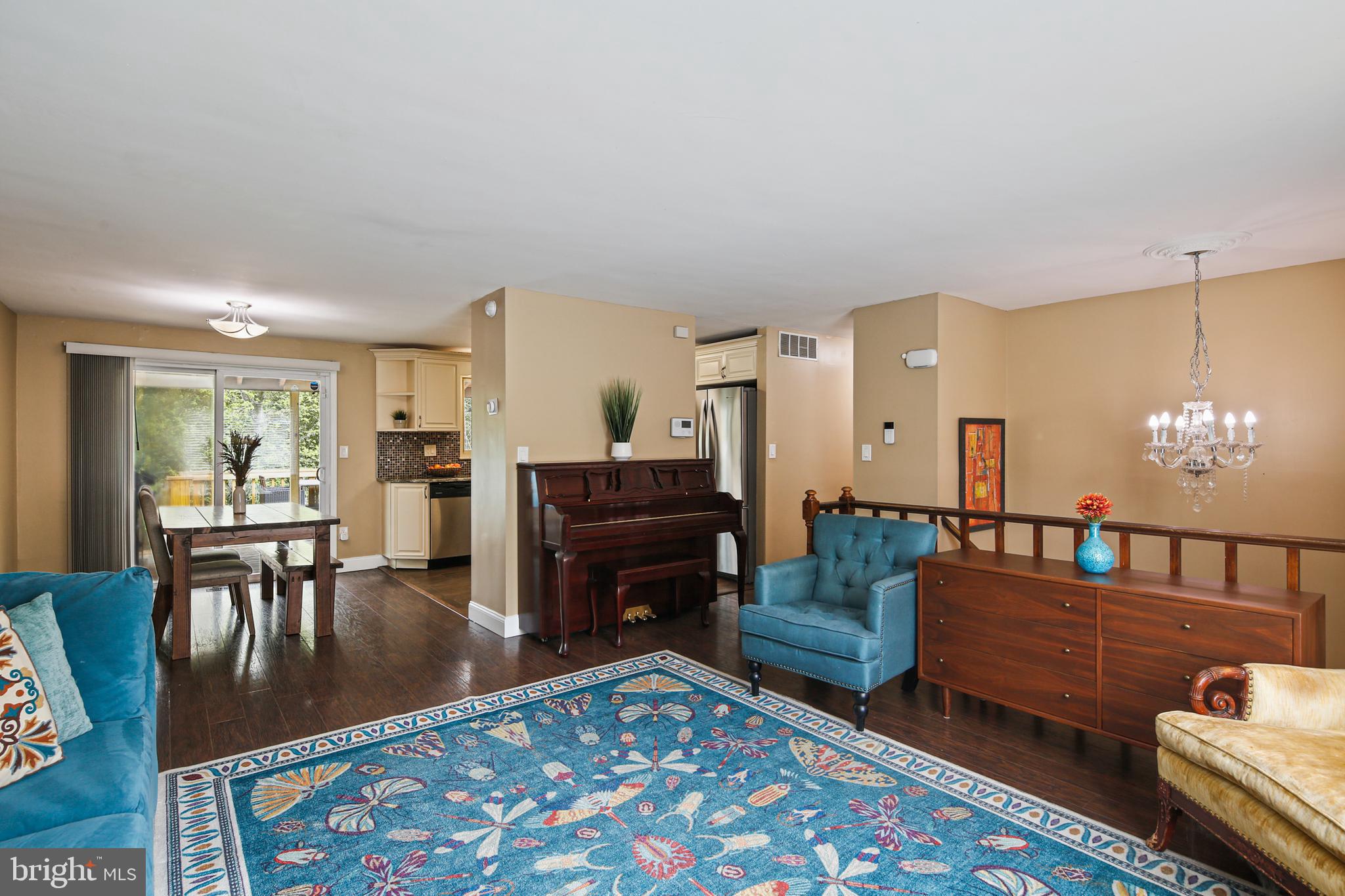 9348 Northgate Road Laurel, MD 20723 - Photo 13 of 42 a living room with furniture and a dining table