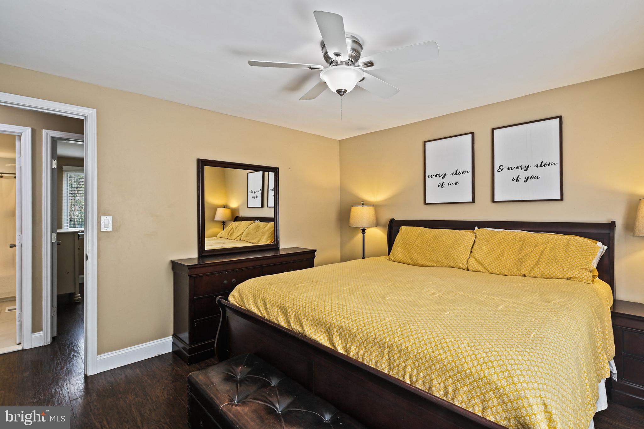 9348 Northgate Road Laurel, MD 20723 - Photo 16 of 42 a bedroom with a bed and a window