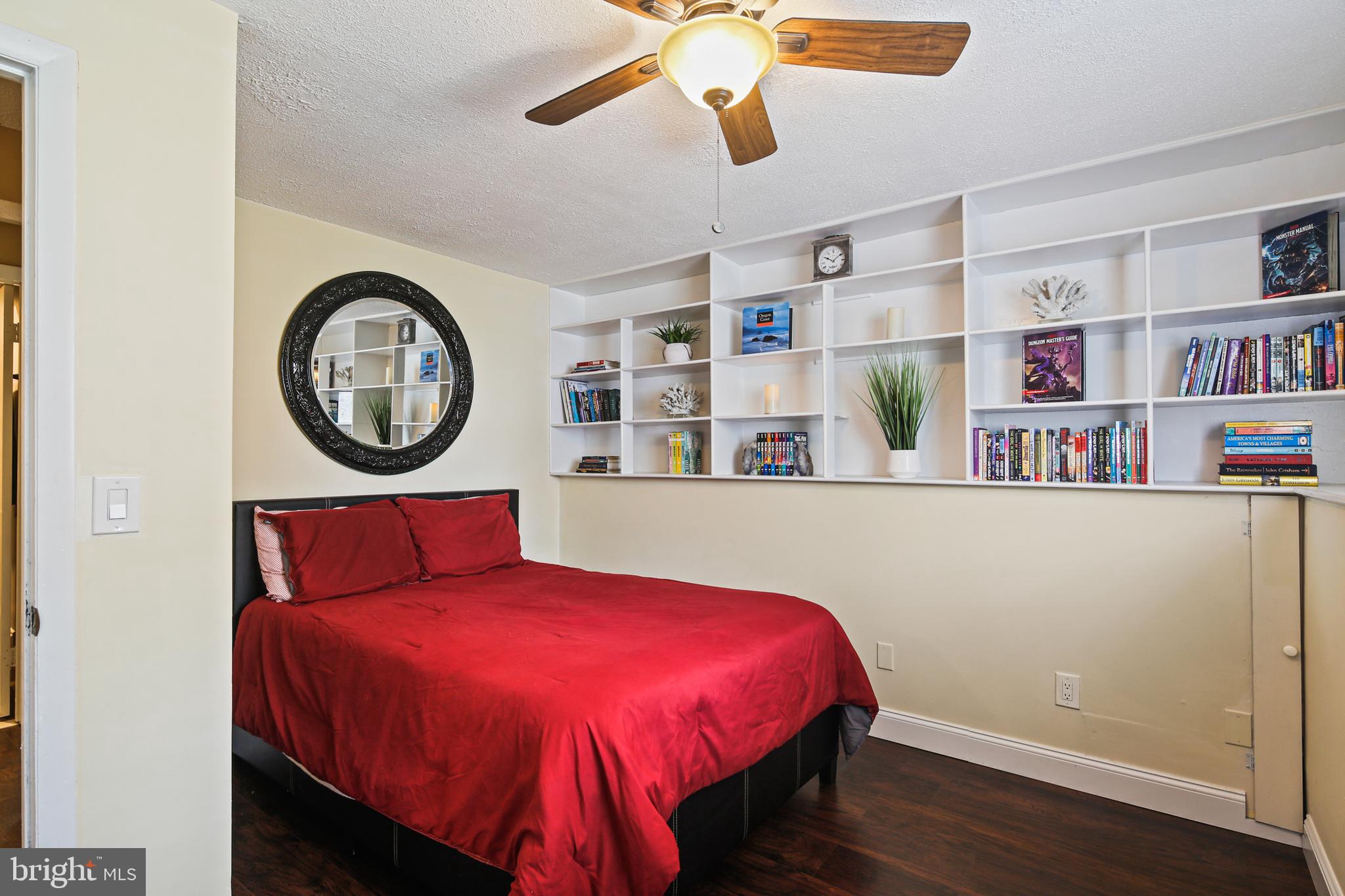 9348 Northgate Road Laurel, MD 20723 - Photo 21 of 42 a bedroom with a bed and a large closet