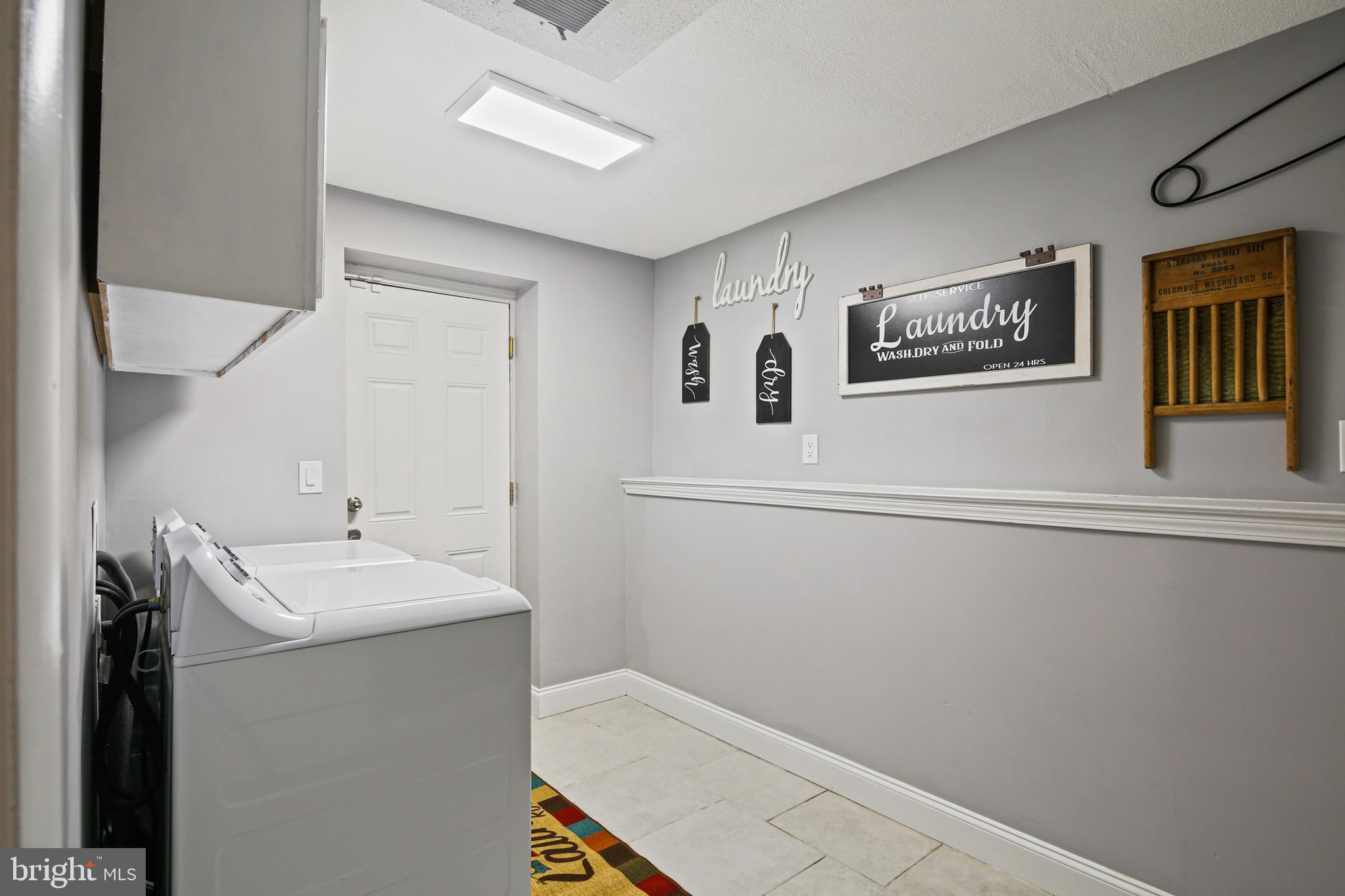 9348 Northgate Road Laurel, MD 20723 - Photo 29 of 42 a bathroom with a sink and a mirror