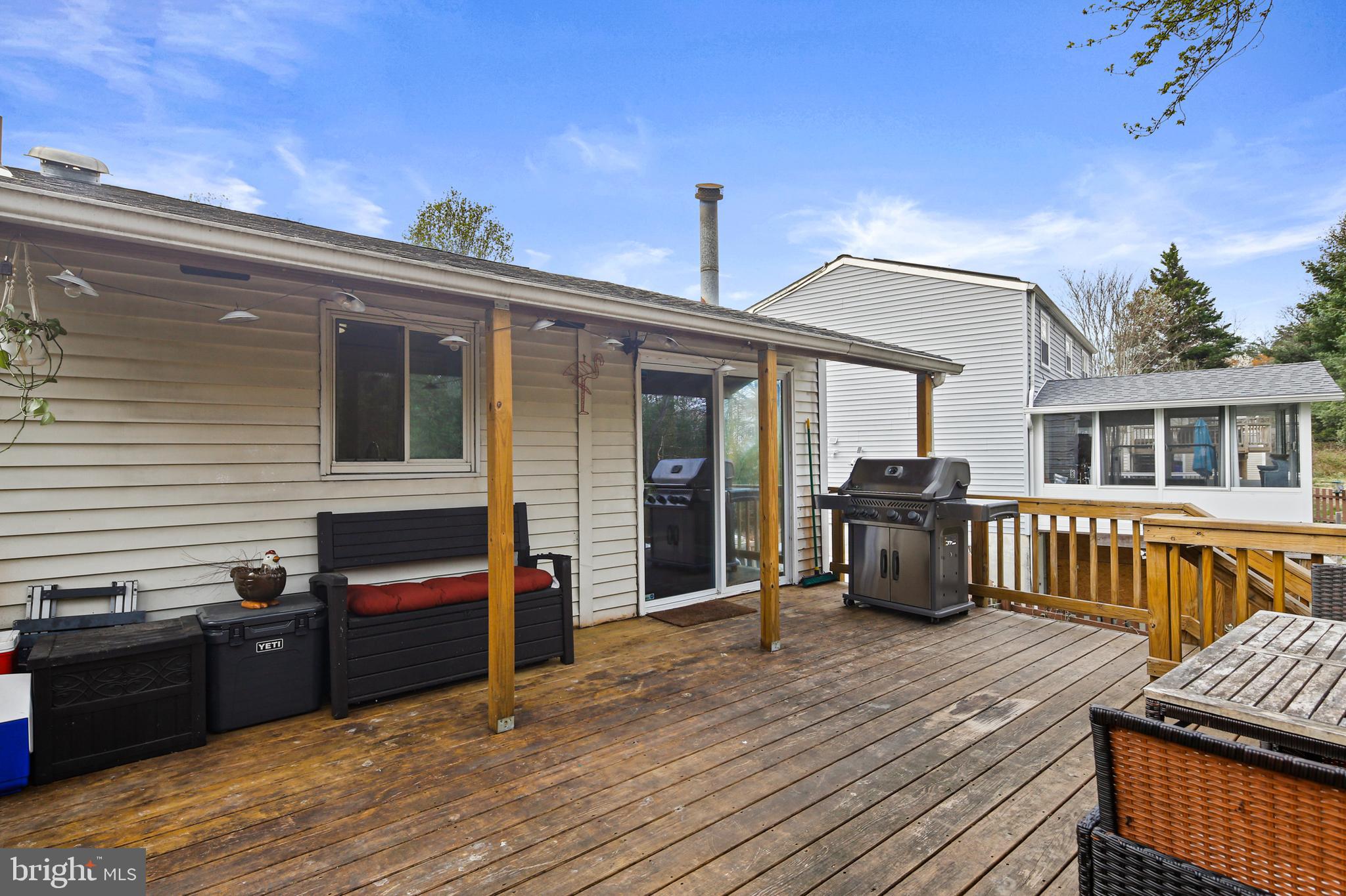 9348 Northgate Road Laurel, MD 20723 - Photo 35 of 42 a view of a house with barbeque oven and furniture