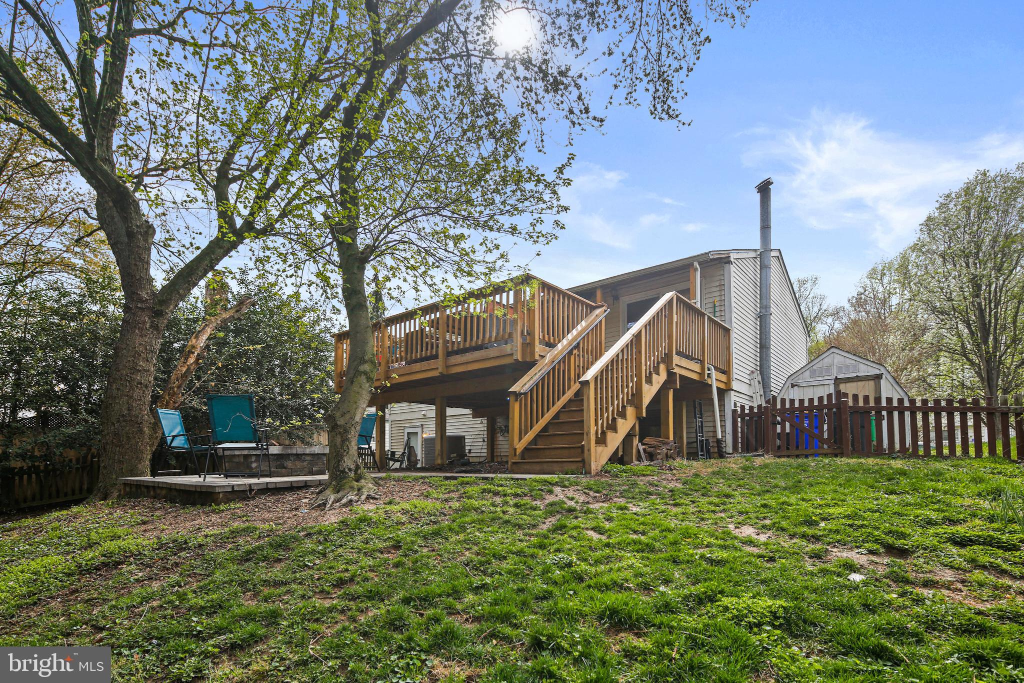 9348 Northgate Road Laurel, MD 20723 - Photo 40 of 42 a view of a house with backyard and a tree
