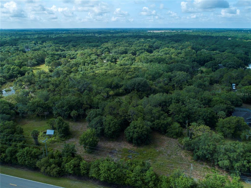 Lightfoot Road Wimauma, FL 33598 - Photo 10 of 16 an aerial view of a house with a yard