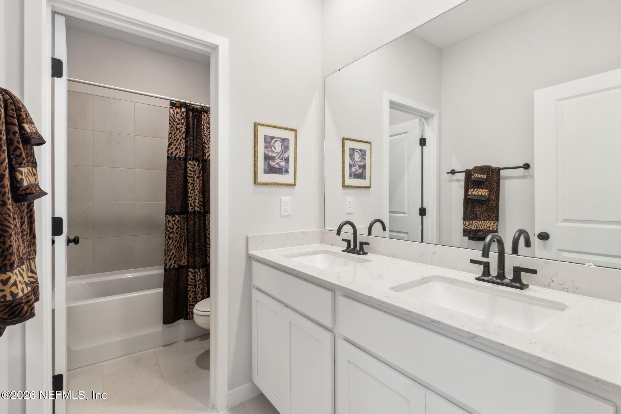 96277 Broadmoore Road Fernandina Beach, FL 32034 - Photo 24 of 31 a bathroom with a sink and a mirror
