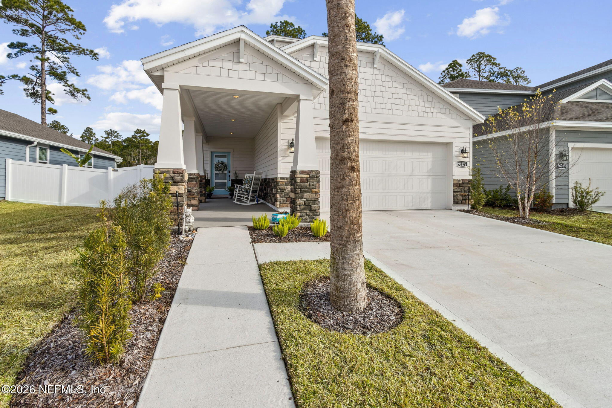 96277 Broadmoore Road Fernandina Beach, FL 32034 - Photo 3 of 31 a view of a pathway with a house in the background
