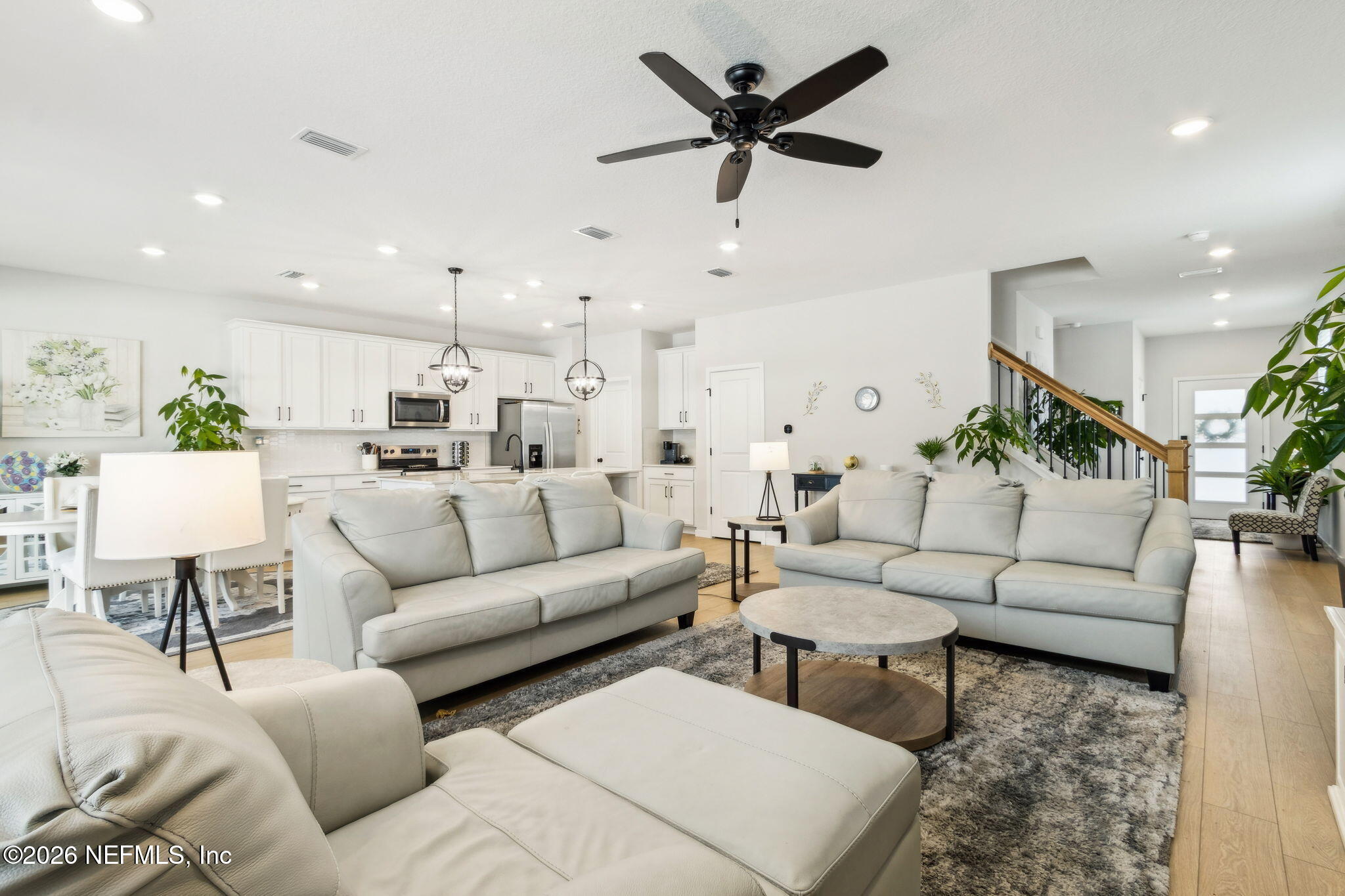 96277 Broadmoore Road Fernandina Beach, FL 32034 - Photo 9 of 31 a living room with furniture white walls and white walls
