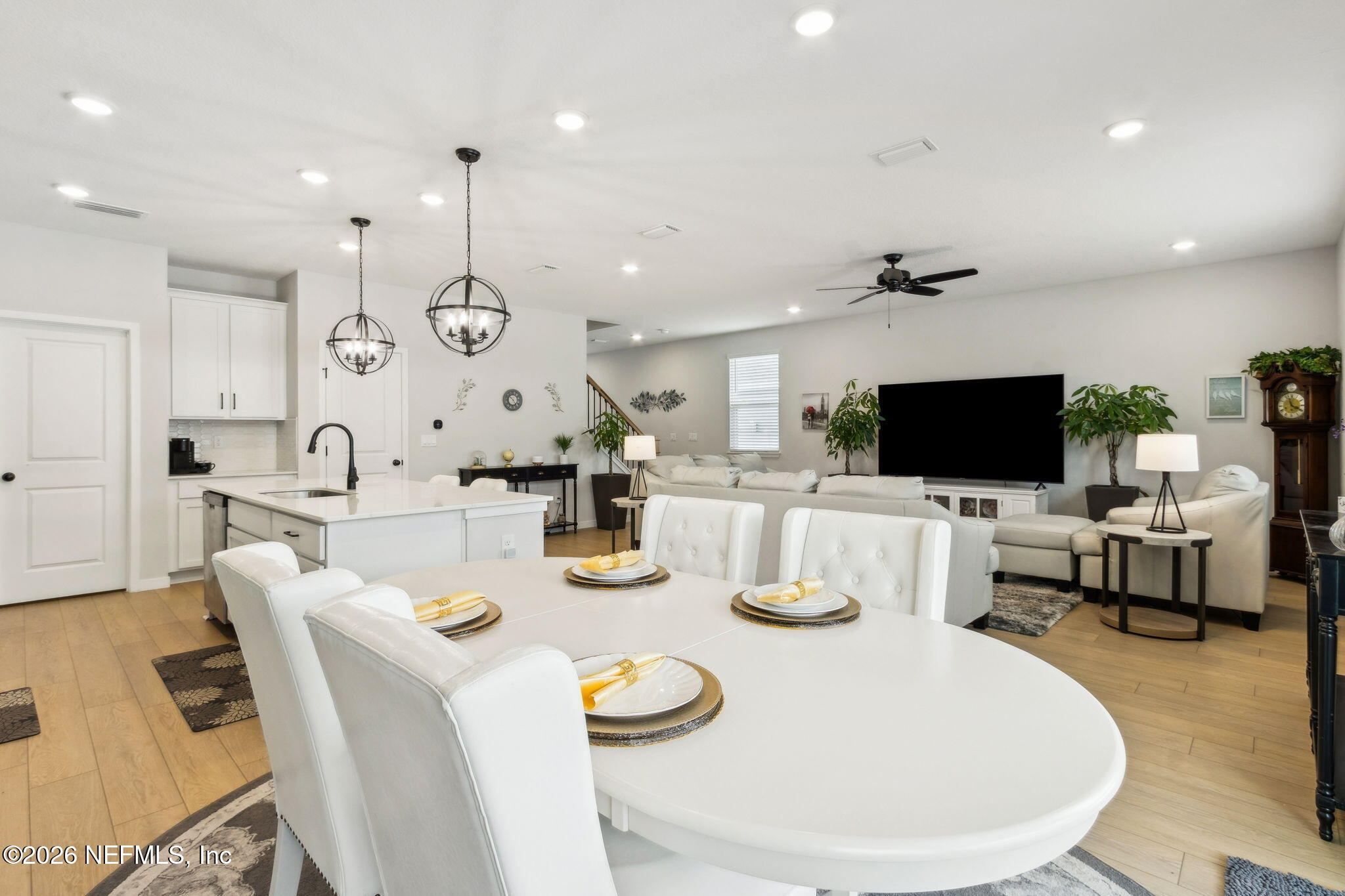 96277 Broadmoore Road Fernandina Beach, FL 32034 - Photo 10 of 31 a large kitchen with a table and chairs