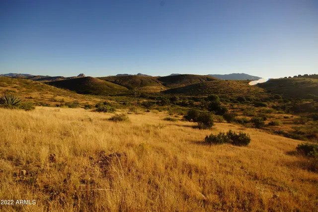 a view of ocean with mountains