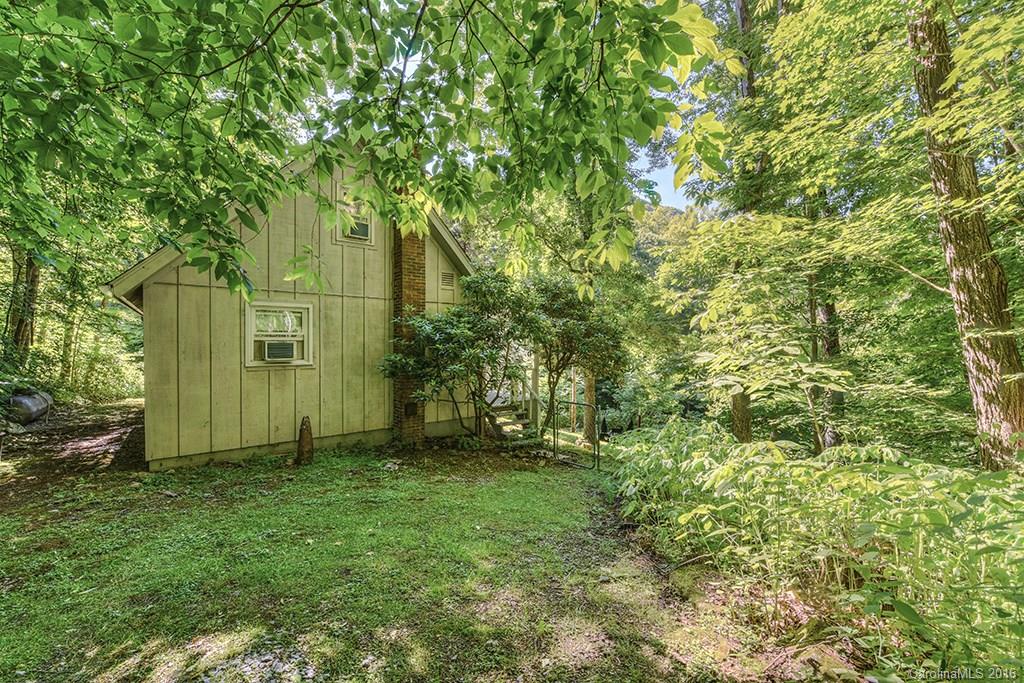 85 Miner Road Waynesville, NC 28785 - Photo 2 of 24 a view of a back yard