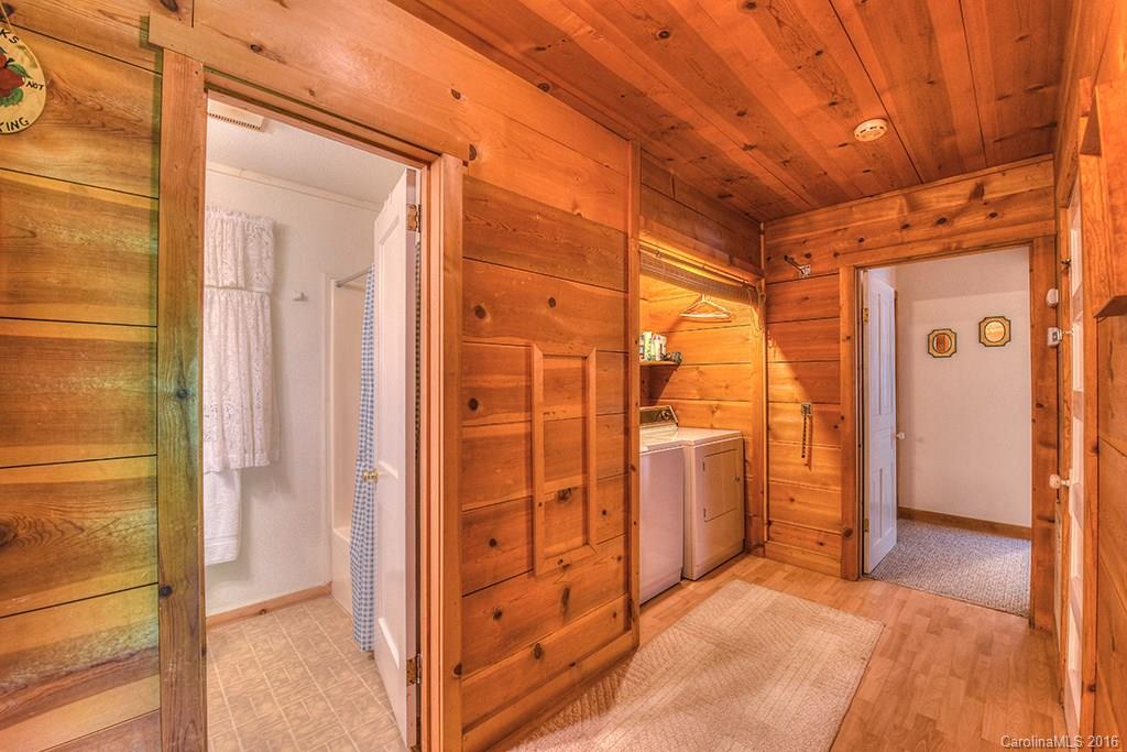 85 Miner Road Waynesville, NC 28785 - Photo 12 of 24 a view of a bathroom with a shower and a sink