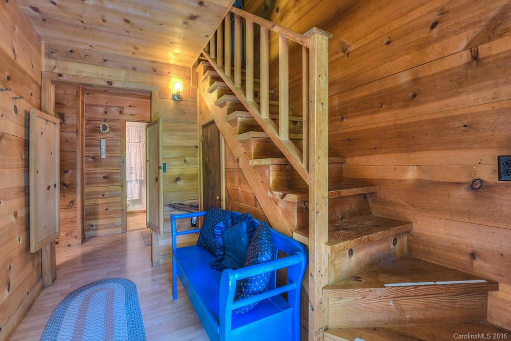 85 Miner Road Waynesville, NC 28785 - Photo 19 of 24 a view of entryway and hall with wooden floor