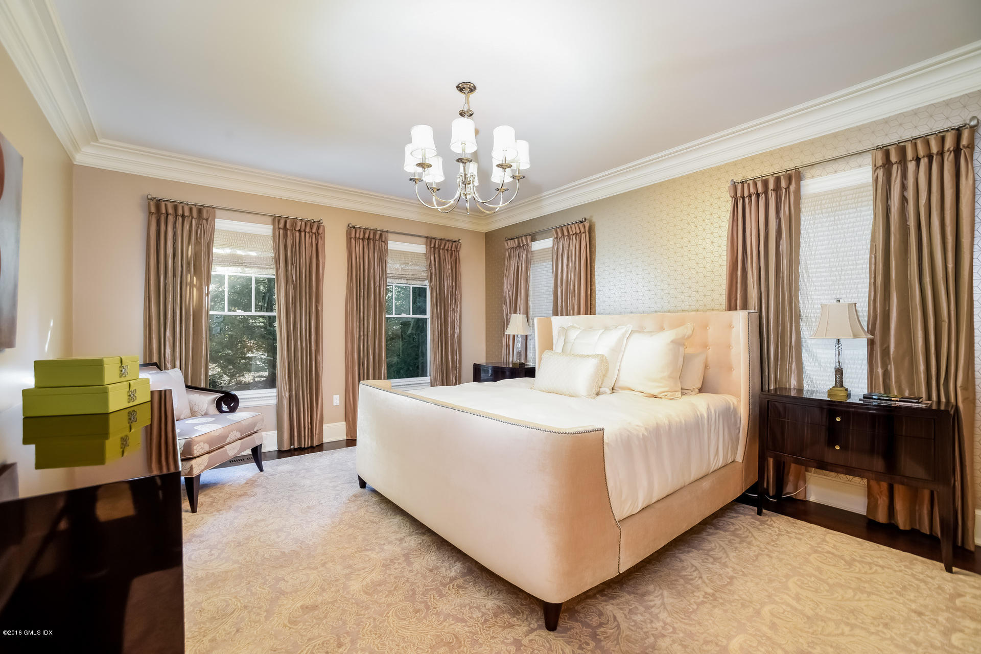 631 Long Ridge Road, Unit 57 Stamford, CT 06902 - Photo 12 of 29 a spacious bedroom with a bed and a chandelier