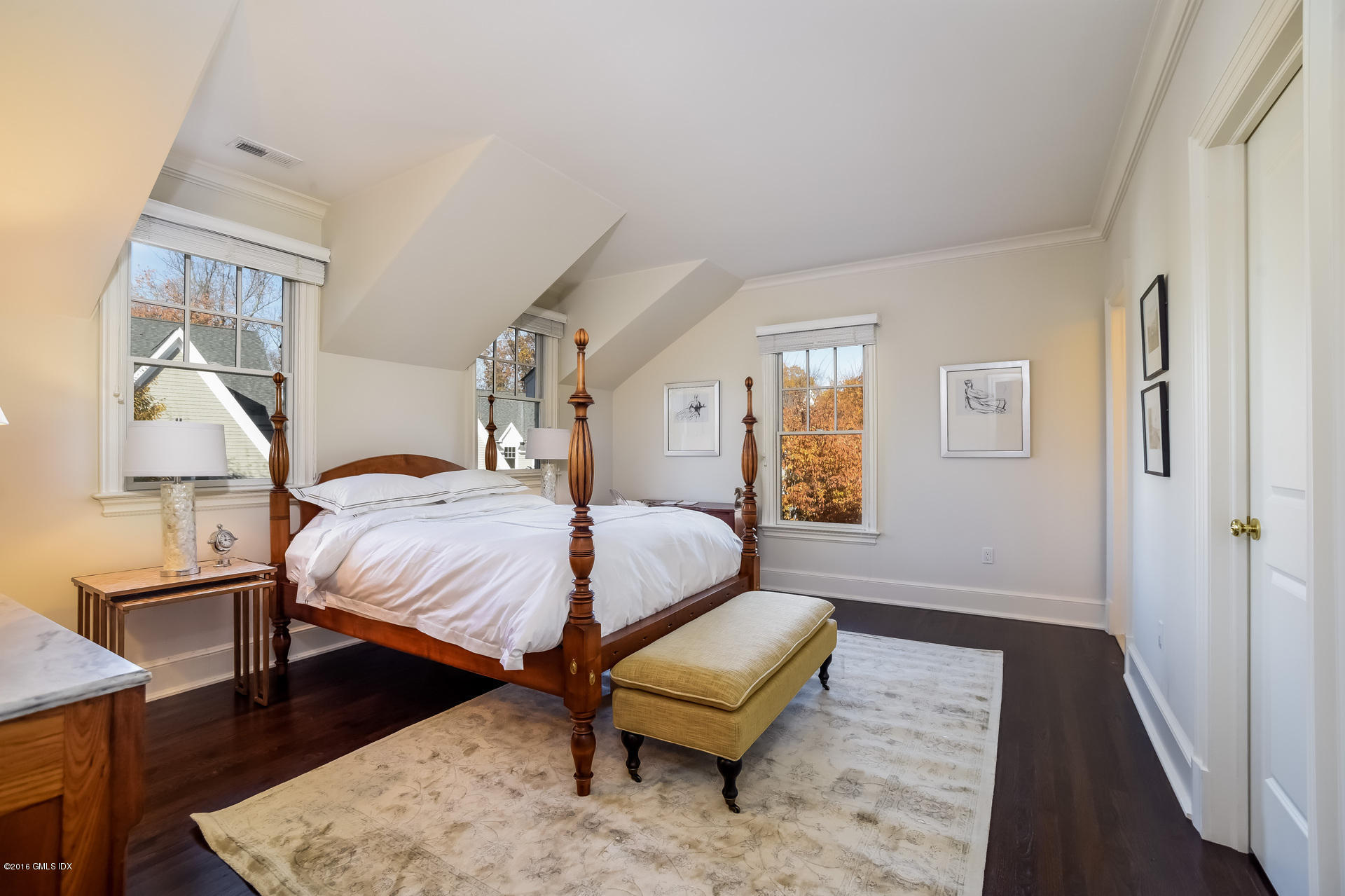 631 Long Ridge Road, Unit 57 Stamford, CT 06902 - Photo 21 of 29 a spacious bedroom with a bed and wooden floor