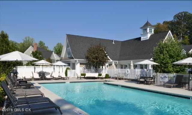 631 Long Ridge Road, Unit 57 Stamford, CT 06902 - Photo 26 of 29 a view of a swimming pool with a patio