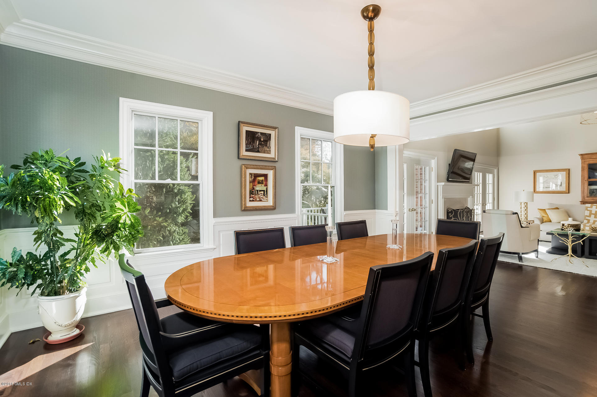 631 Long Ridge Road, Unit 57 Stamford, CT 06902 - Photo 6 of 29 a view of a dining room with furniture and wooden floor