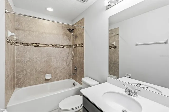 a view of a glass door with a living room