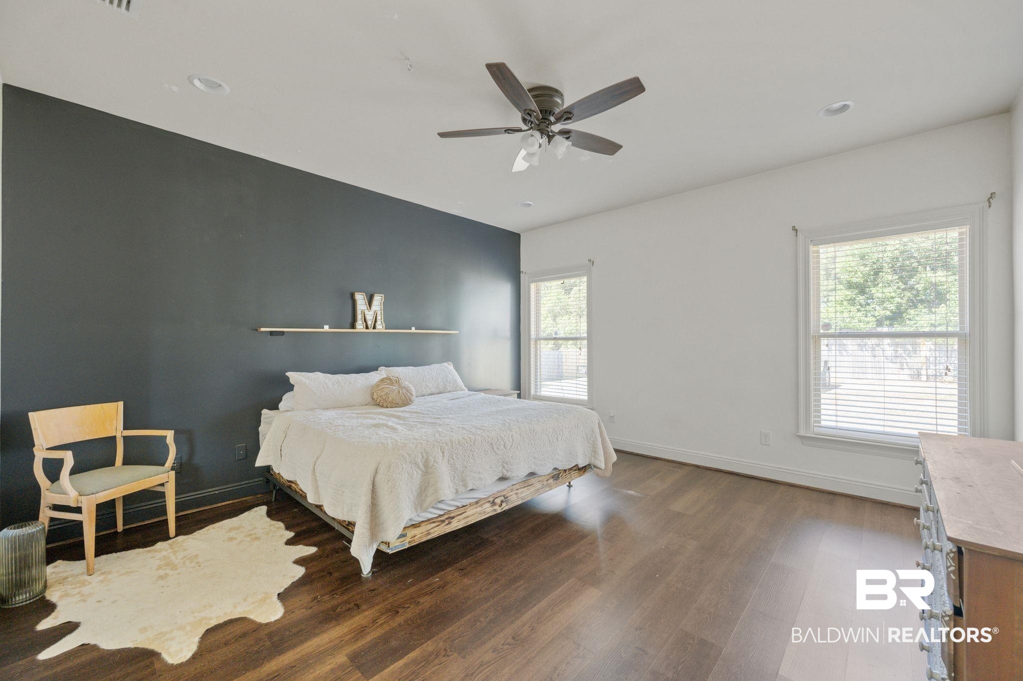 3879 Symphony Way West Semmes, AL 36575 - Photo 15 of 34 Bedroom featuring ceiling fan and wood-type flooring
