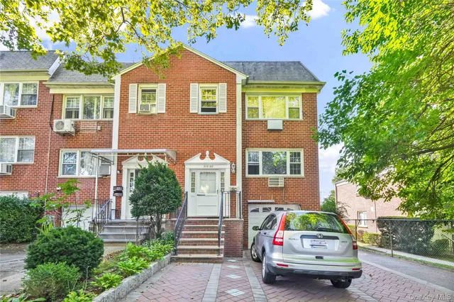 a car parked in front of a house