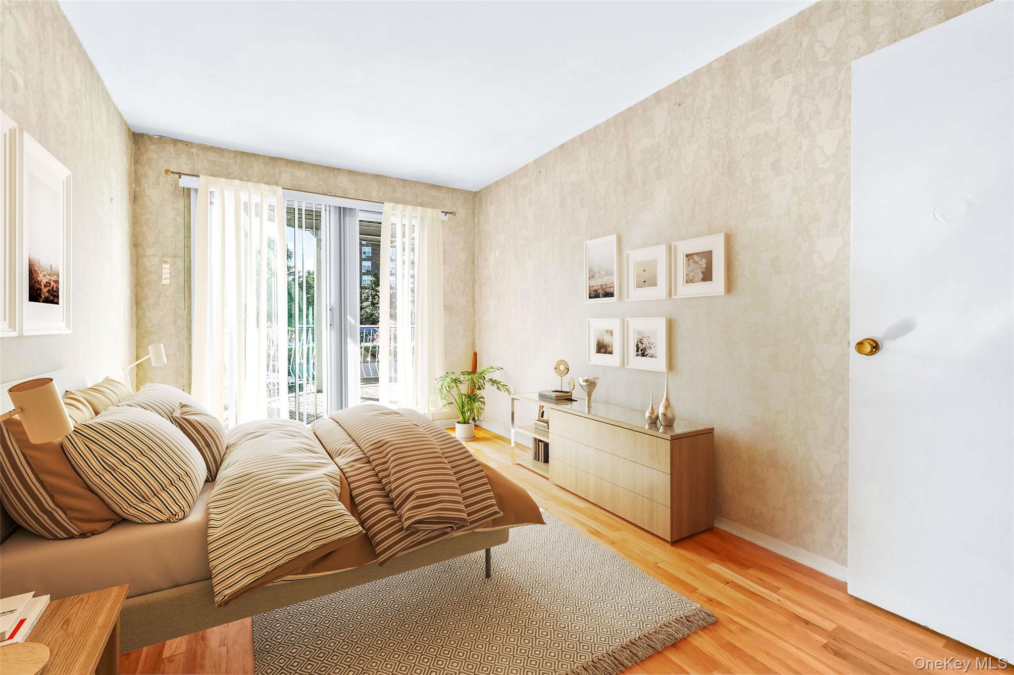 21260 16th Avenue Queens, NY 11360 - Photo 21 of 37 a spacious bedroom with a balcony a bed and a window