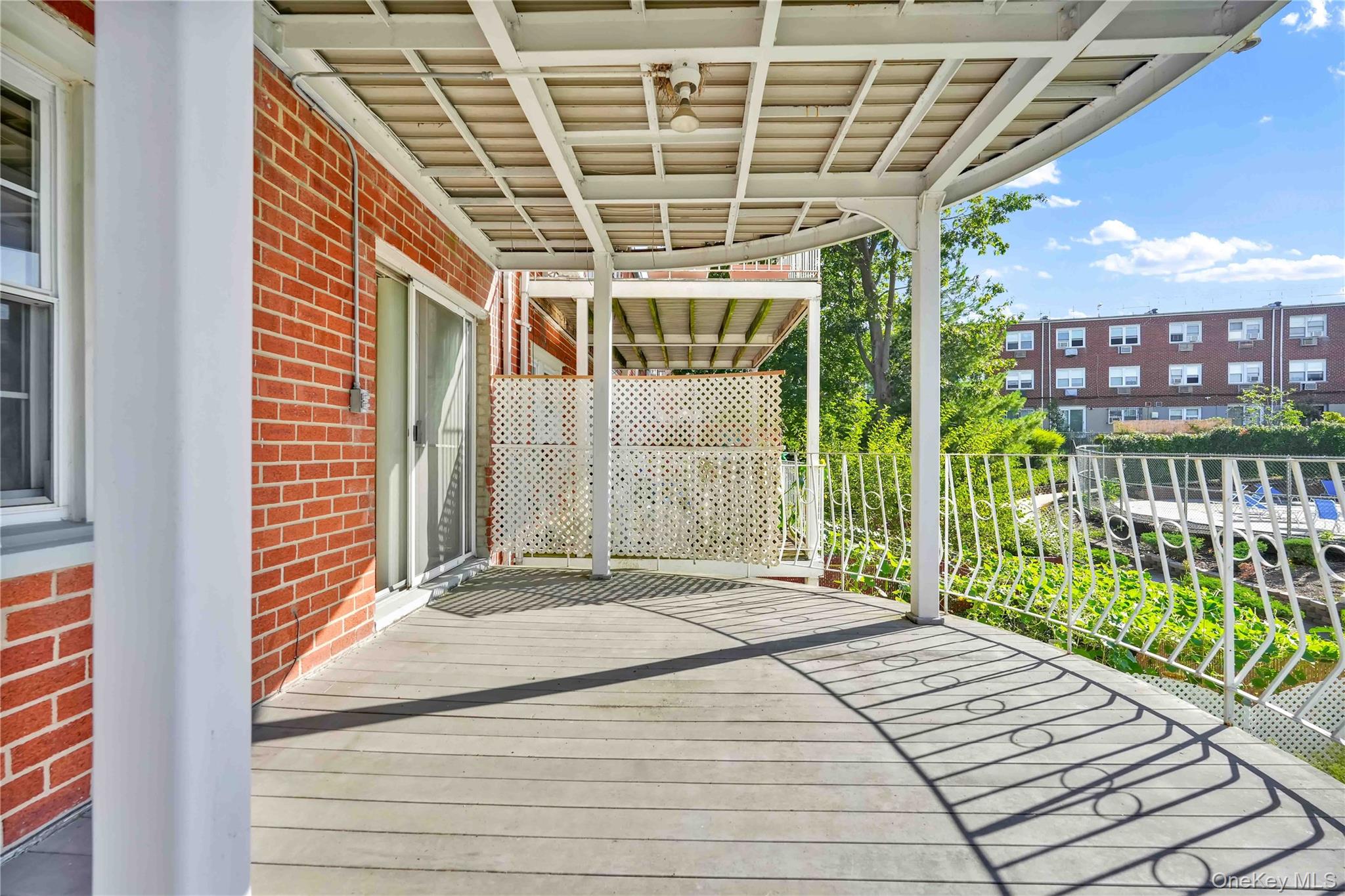 21260 16th Avenue Queens, NY 11360 - Photo 22 of 37 a balcony view with a outdoor space
