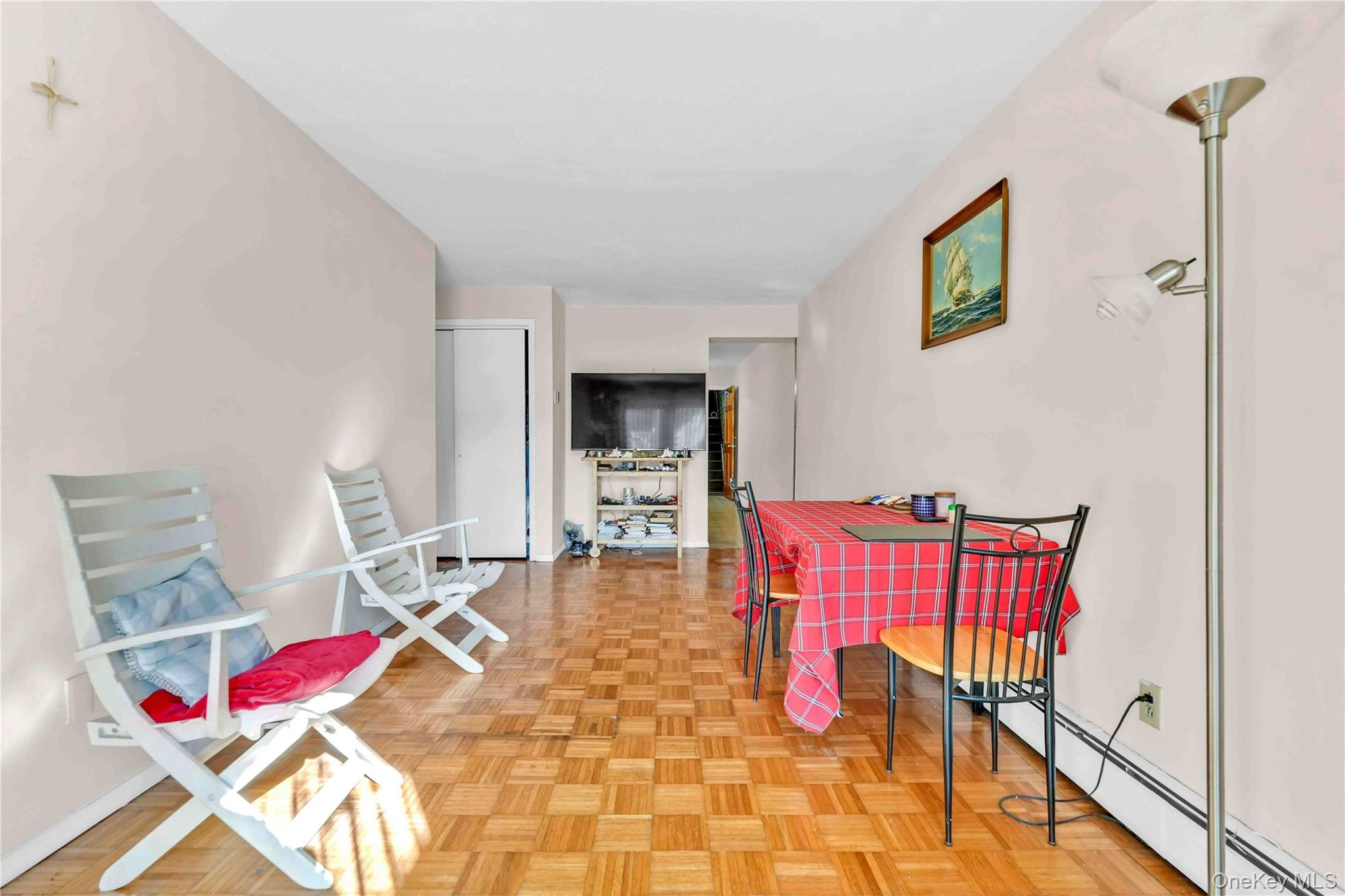 21260 16th Avenue Queens, NY 11360 - Photo 26 of 37 a bedroom with furniture and a couch