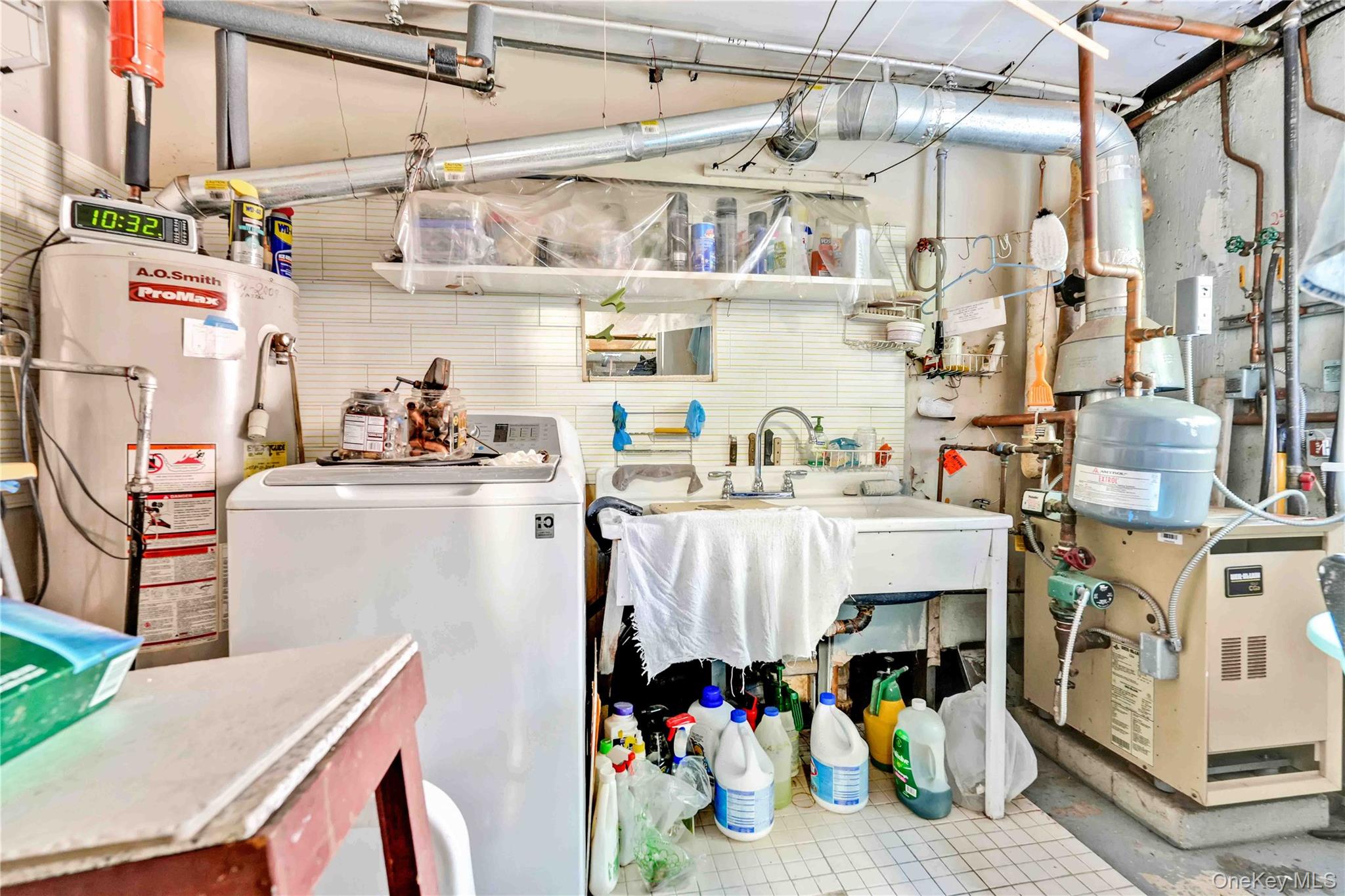21260 16th Avenue Queens, NY 11360 - Photo 29 of 37 a view of storage and utility room and utility room