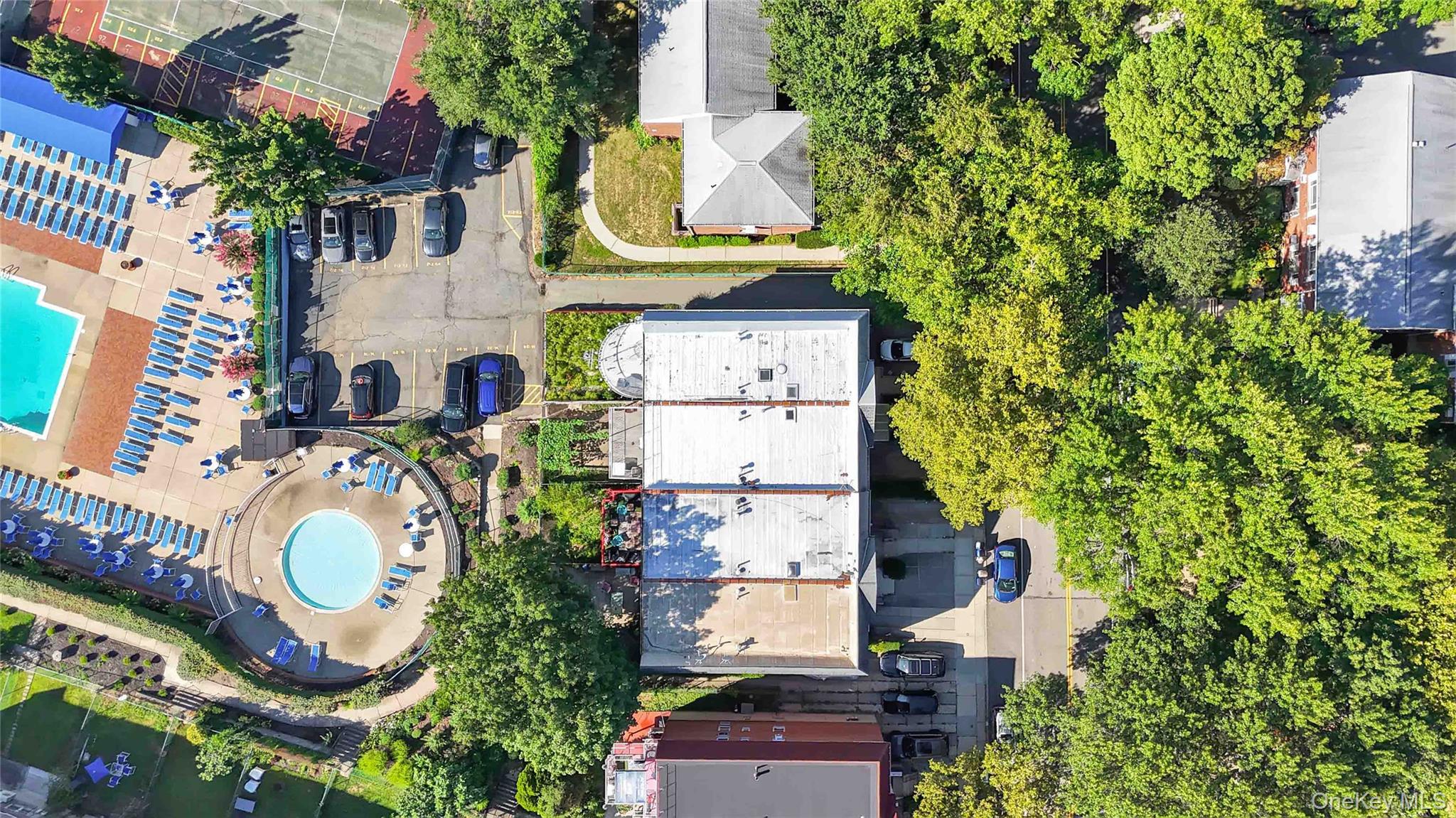21260 16th Avenue Queens, NY 11360 - Photo 33 of 37 an aerial view of a house with garden space and street view