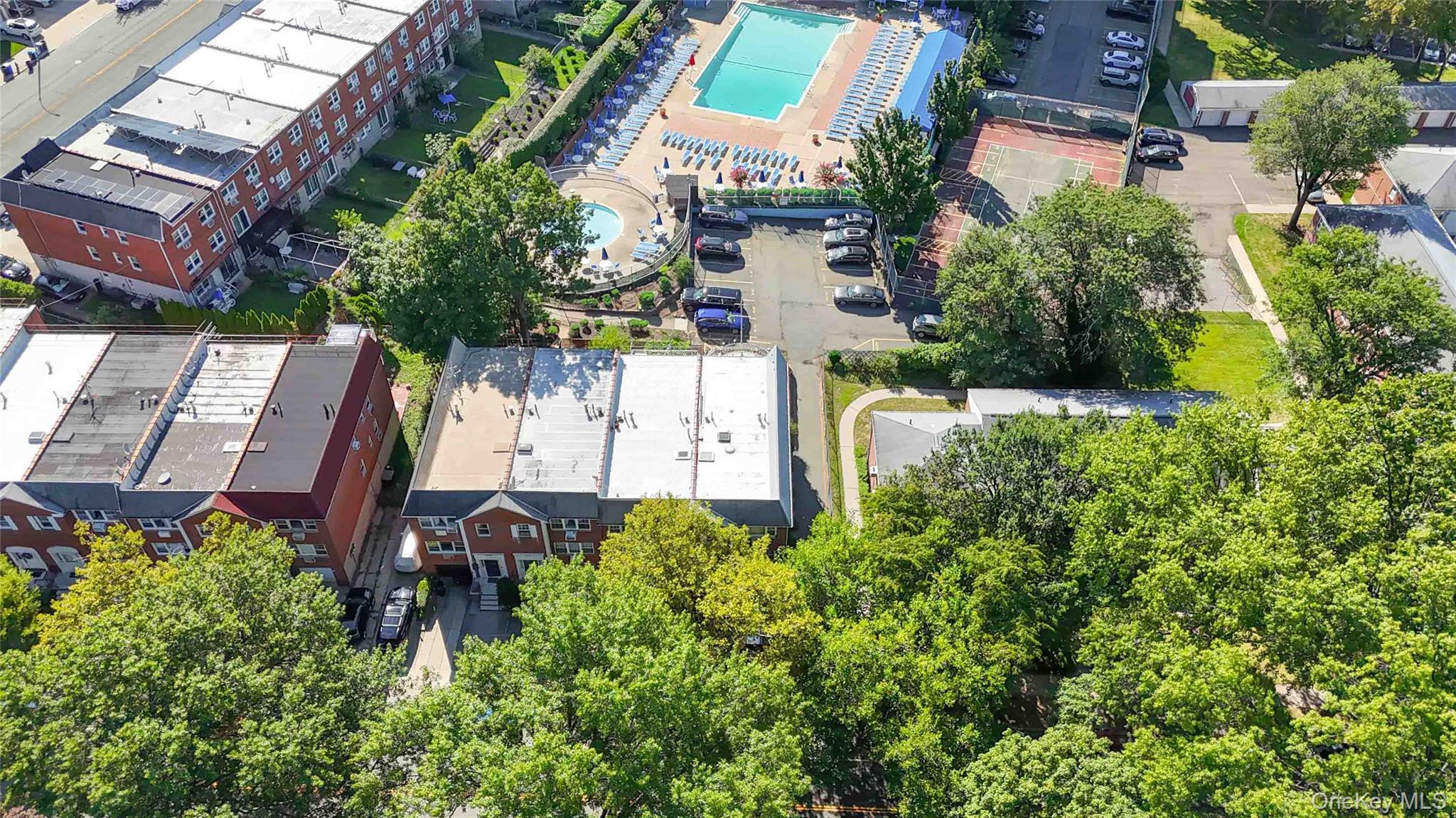 21260 16th Avenue Queens, NY 11360 - Photo 34 of 37 an aerial view of multiple houses with yard