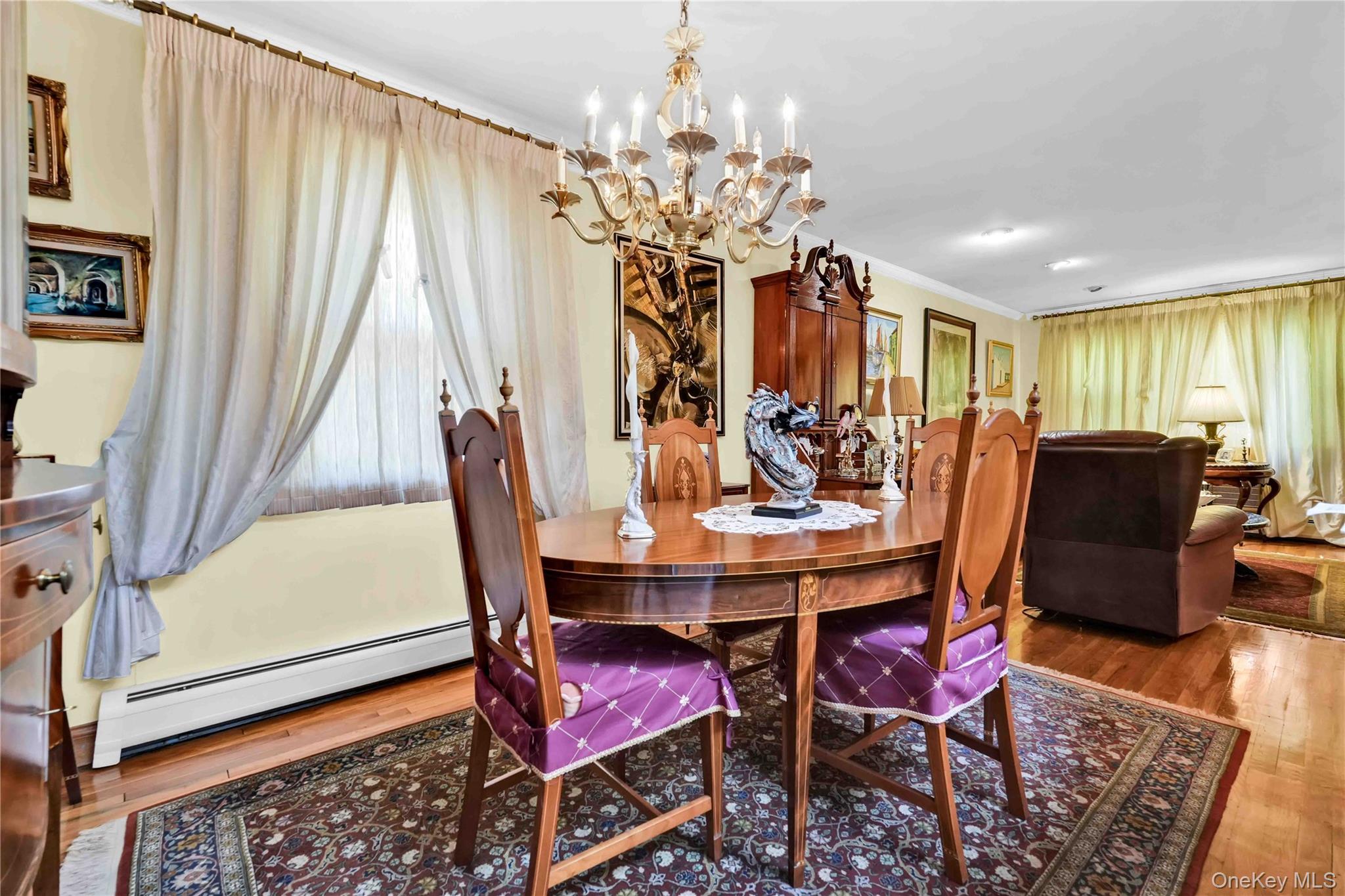 21260 16th Avenue Queens, NY 11360 - Photo 4 of 37 a view of a dining room with furniture and window