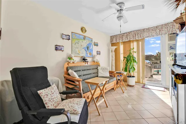 a workspace with furniture and a chandelier