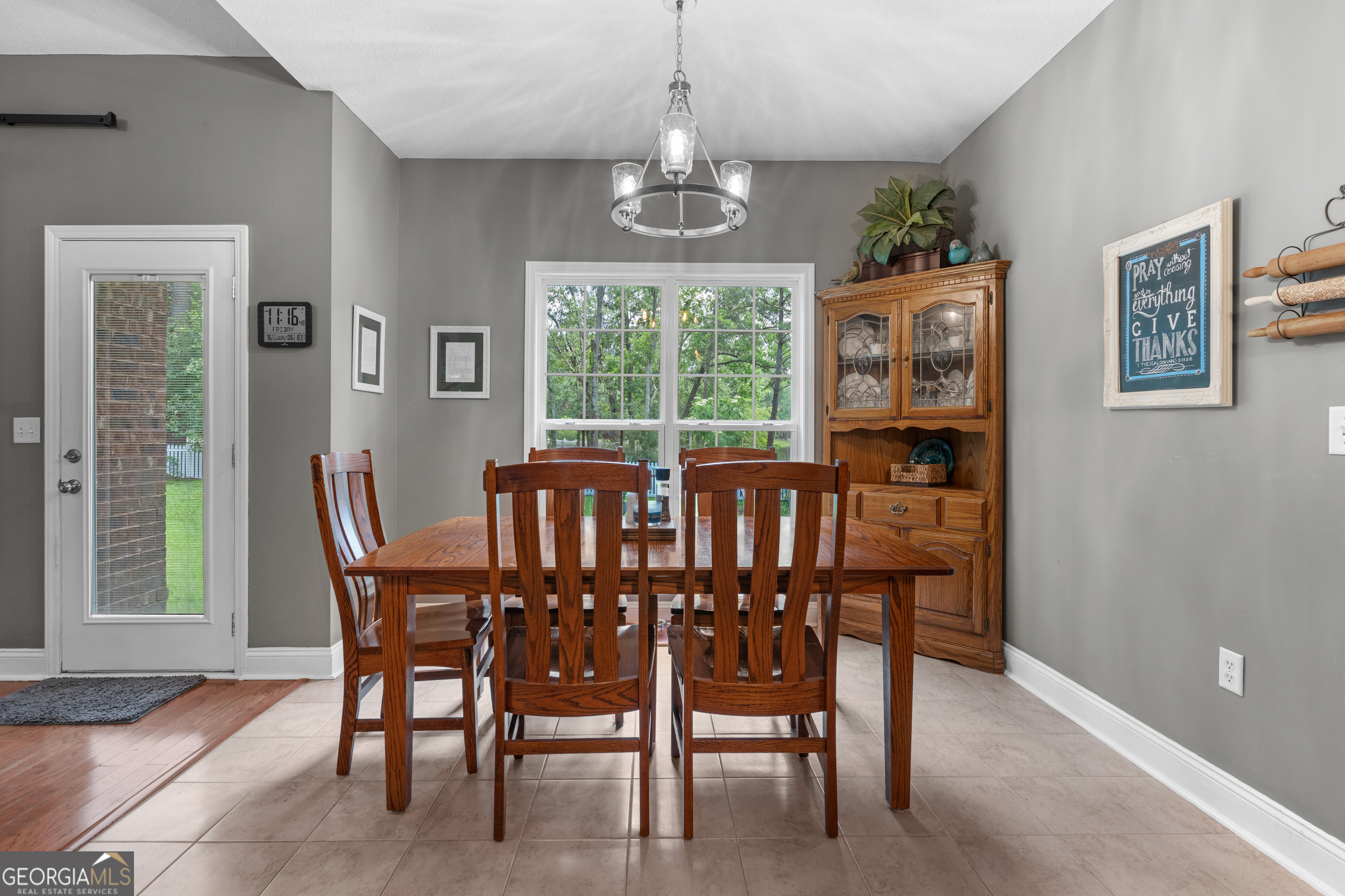 1603 Lennox Road Statesboro, GA 30461 - Photo 17 of 45 a view of a dining room with furniture window and outside view