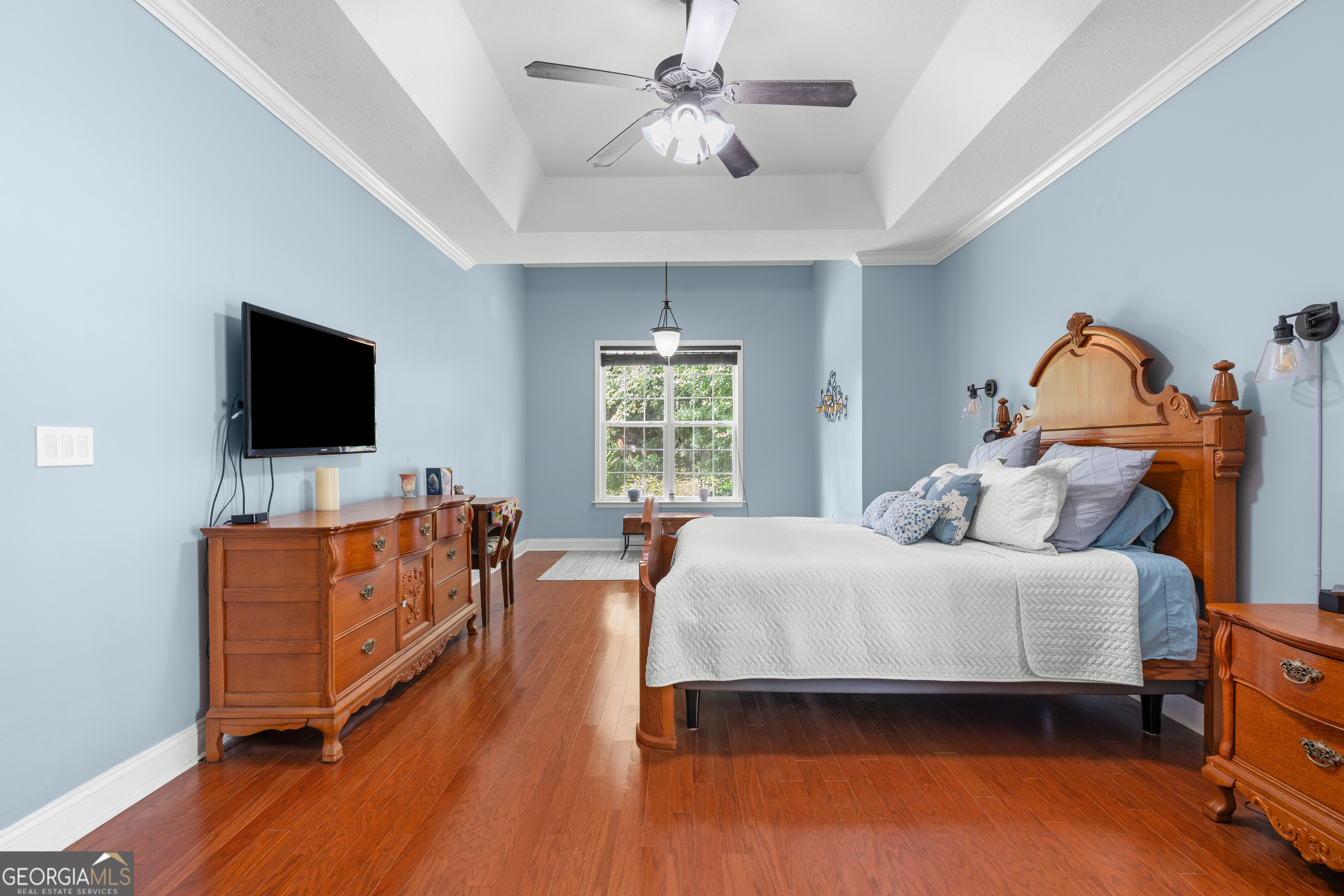 1603 Lennox Road Statesboro, GA 30461 - Photo 19 of 45 a bedroom with a bed and a flat screen tv