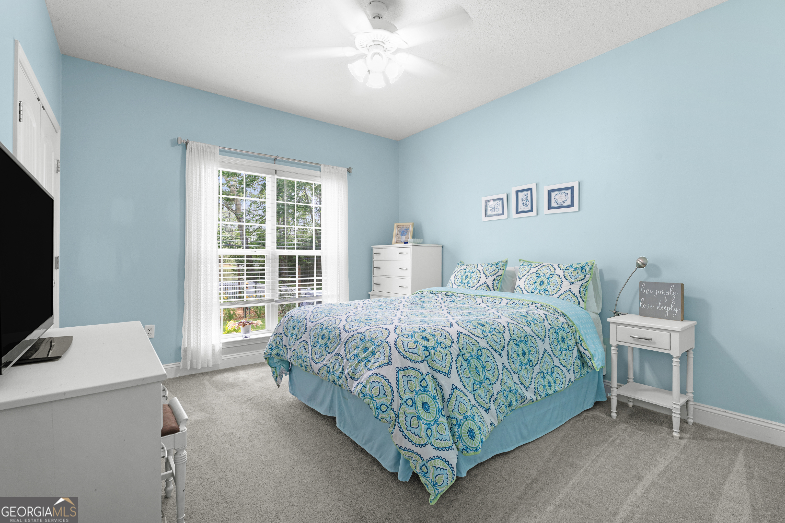 1603 Lennox Road Statesboro, GA 30461 - Photo 26 of 45 a bedroom with a bed and a desk