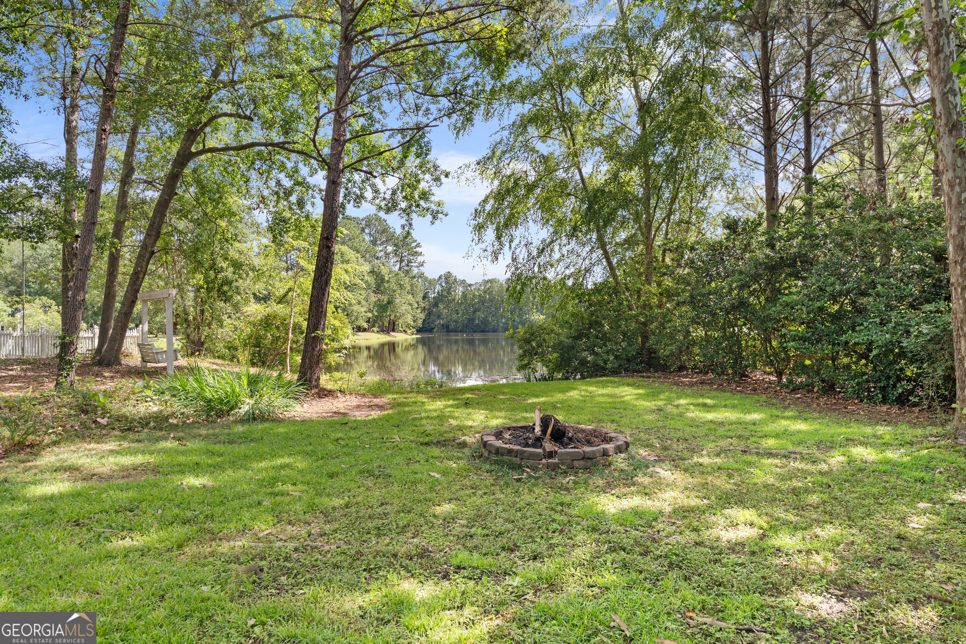 1603 Lennox Road Statesboro, GA 30461 - Photo 32 of 45 a backyard of a house with lots of green space
