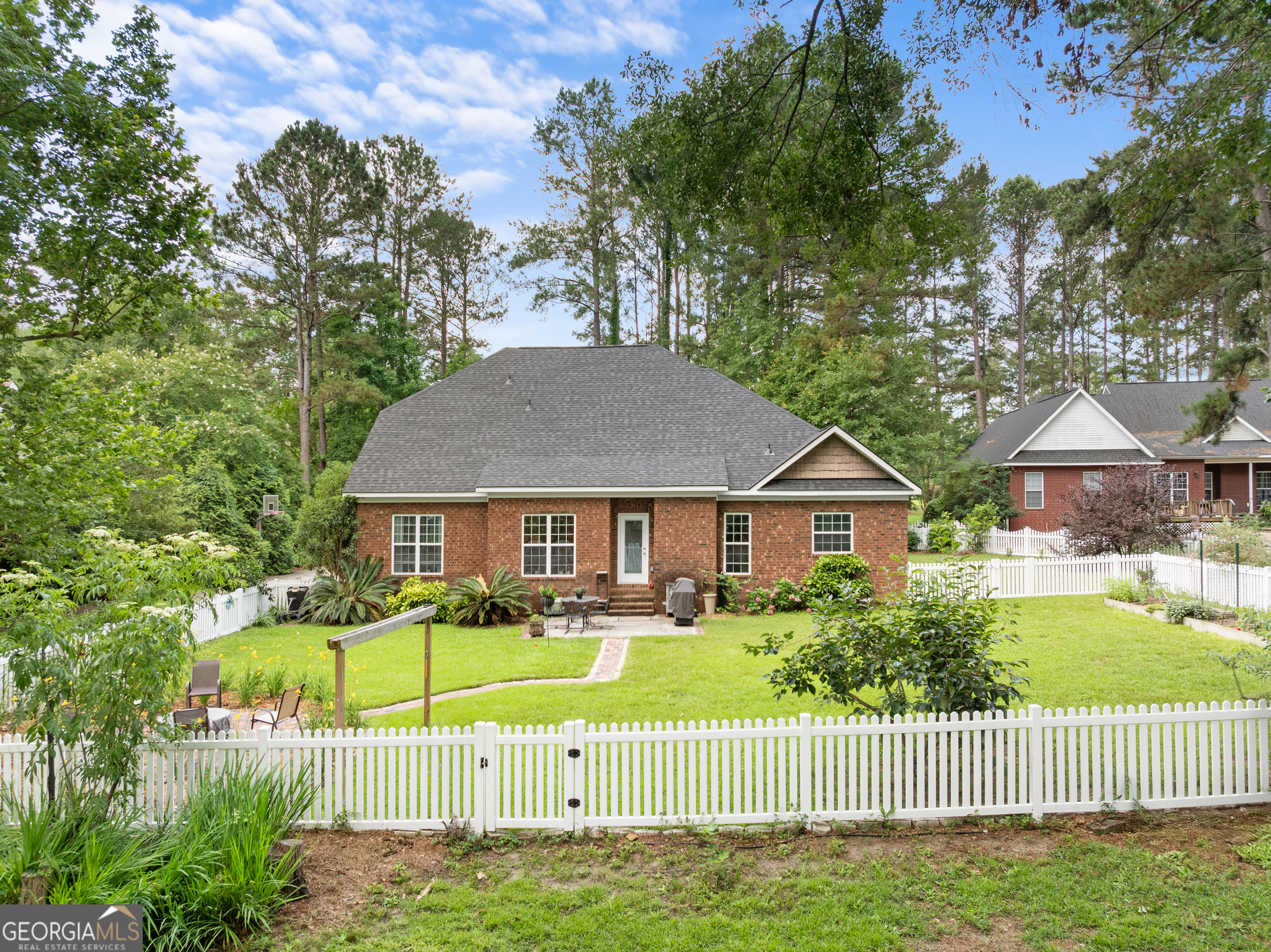 1603 Lennox Road Statesboro, GA 30461 - Photo 36 of 45 a front view of house with yard and green space