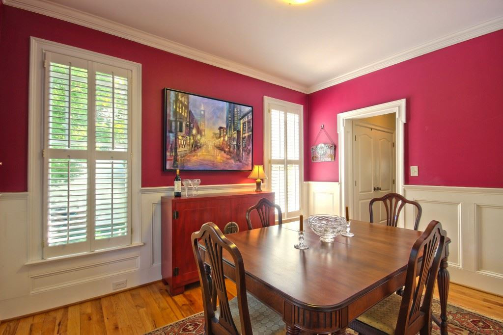 516 Pace Street Raleigh, NC 27604 - Photo 8 of 25 Its all about the attention to detail in this home. The custom wainscoting, crown molding, hardwood floors. Dining Room