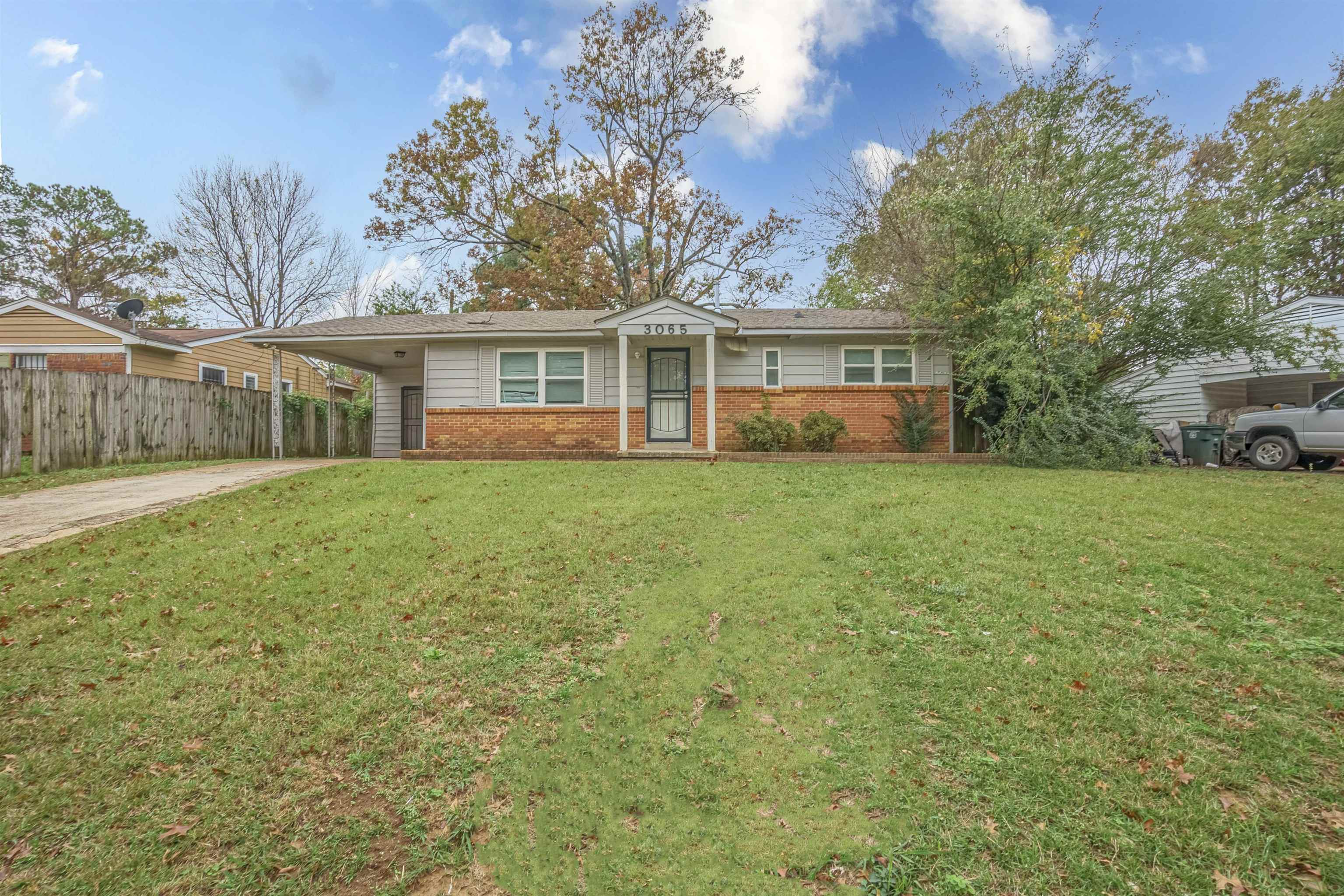 front view of a house and a yard