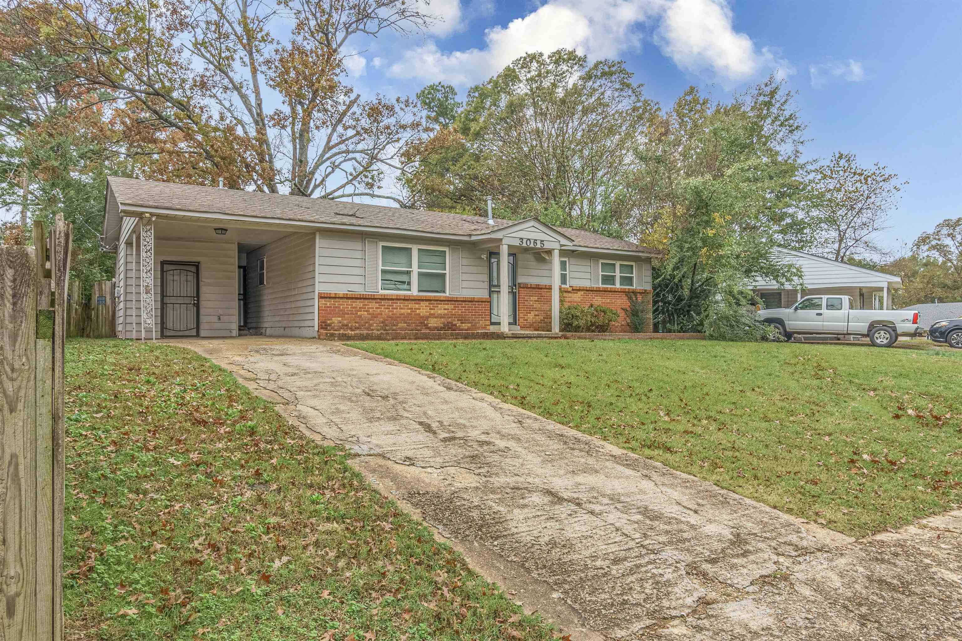 3065 Randy Lane Memphis, TN 38118 - Photo 2 of 16 a front view of house with yard and green space