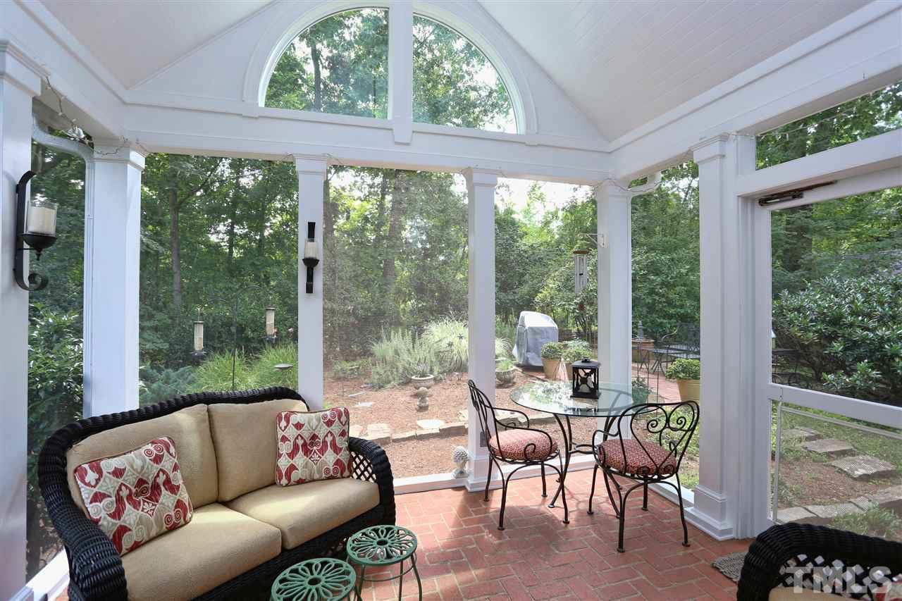 341 Tenney Circle Chapel Hill, NC 27514 - Photo 18 of 21 a living room with furniture and a floor to ceiling window