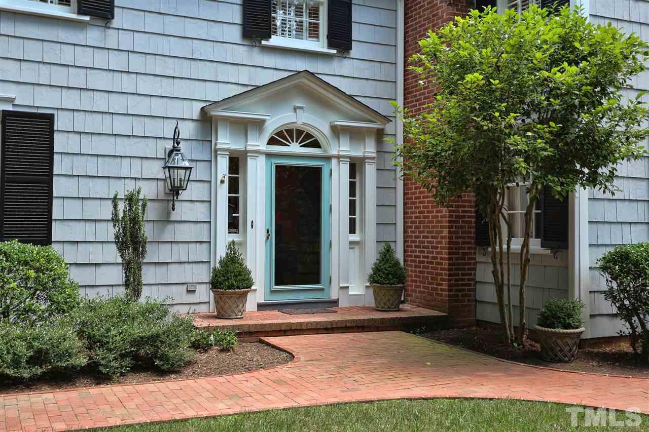 341 Tenney Circle Chapel Hill, NC 27514 - Photo 2 of 21 a front view of a house with a yard