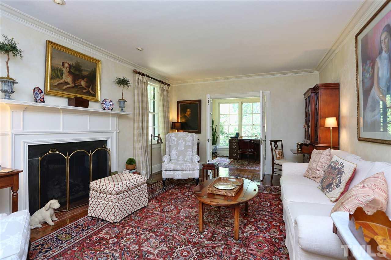 341 Tenney Circle Chapel Hill, NC 27514 - Photo 4 of 21 a living room with furniture and a fireplace