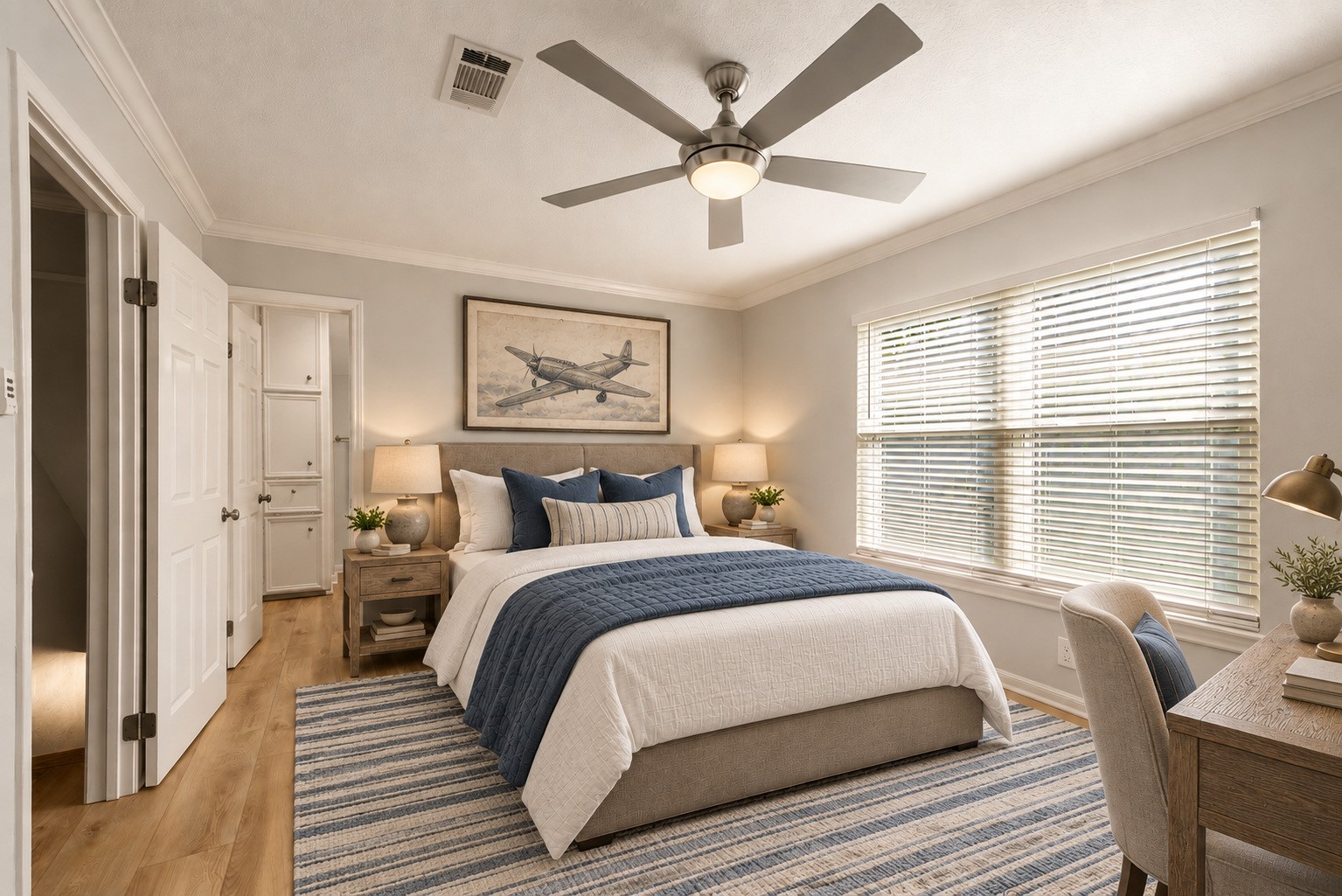 9203 Godstone Lane Spring, TX 77379 - Photo 21 of 38 All upstairs Bedrooms are equipped with new luxury vinyl plank flooring and ceiling fans. This Bedroom offers abundant natural light, a huge walk-in closet and a private Bathroom. Image has been virtually staged.