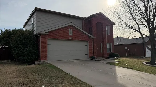 a front view of house with yard