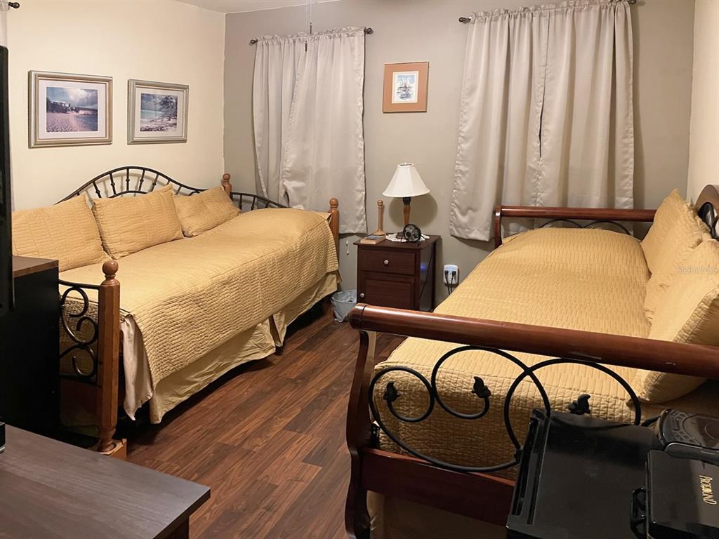 10025 Winding River Road Punta Gorda, FL 33950 - Photo 21 of 30 a bedroom with bed and a window