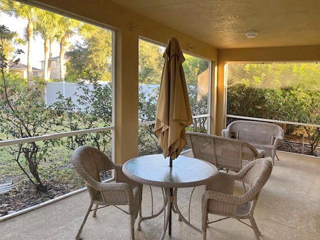 10025 Winding River Road Punta Gorda, FL 33950 - Photo 25 of 30 a view of a city from a dining room with large windows