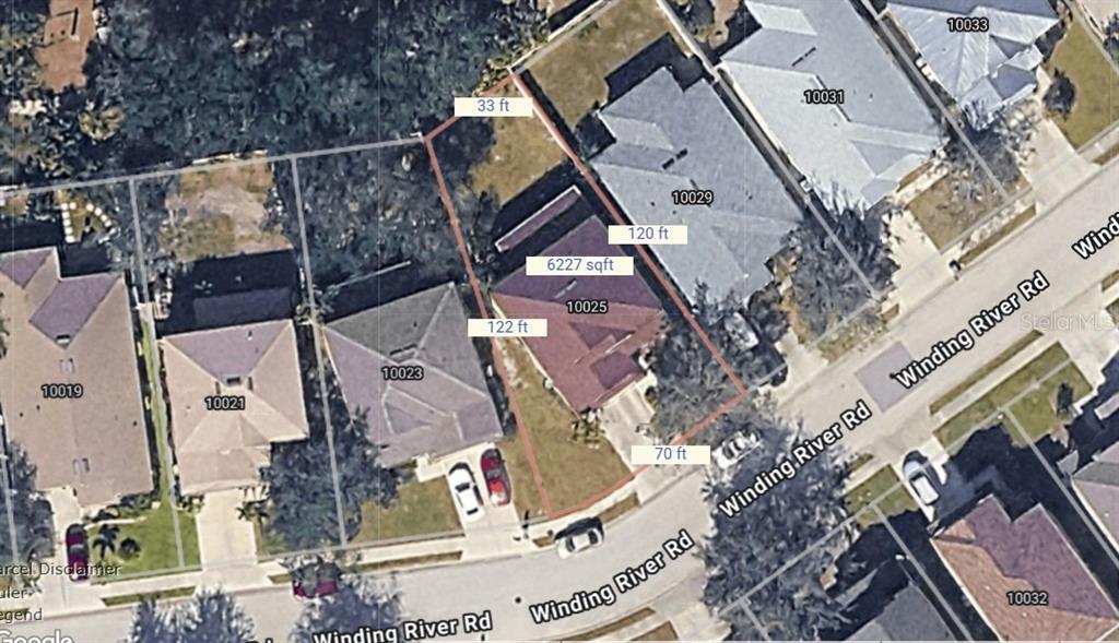 10025 Winding River Road Punta Gorda, FL 33950 - Photo 30 of 30 an aerial view of a house with a yard