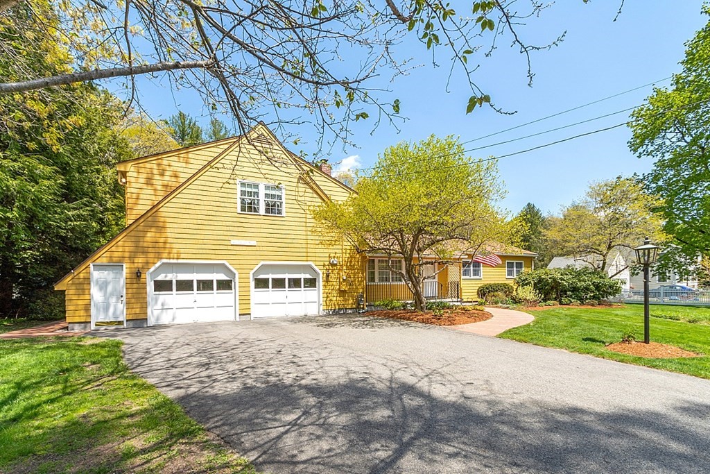 16 Galloway Road Chelmsford, MA 01824 - Photo 1 of 42 a front view of a house with a road