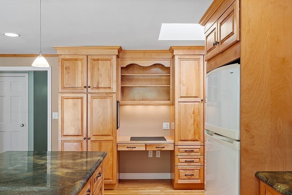 16 Galloway Road Chelmsford, MA 01824 - Photo 18 of 42 a kitchen with stainless steel appliances granite countertop a refrigerator and a stove