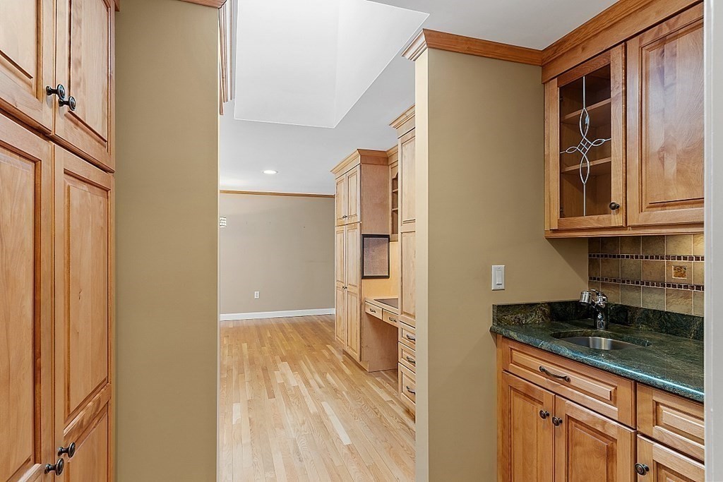 16 Galloway Road Chelmsford, MA 01824 - Photo 19 of 42 a kitchen with stainless steel appliances granite countertop a refrigerator and a sink