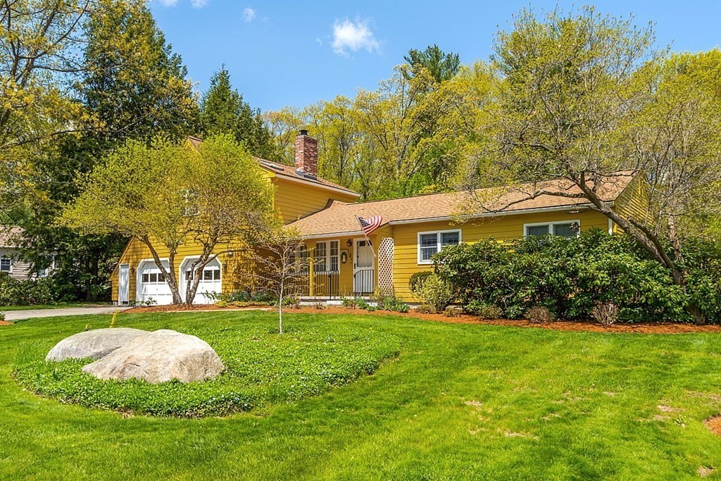 16 Galloway Road Chelmsford, MA 01824 - Photo 3 of 42 a front view of a house with garden and trees